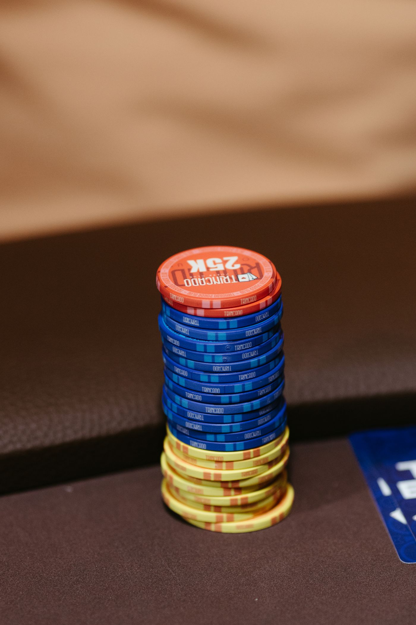 Colorful poker chips stacked on a casino table
